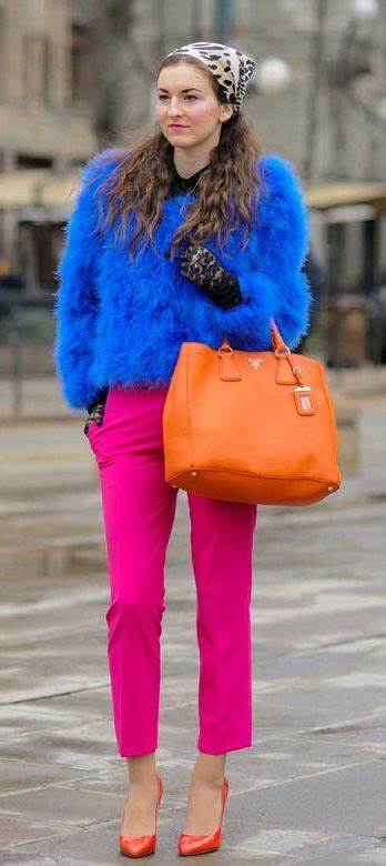 A picture of a woman wearing an outfit in a pink triadic colour scheme.