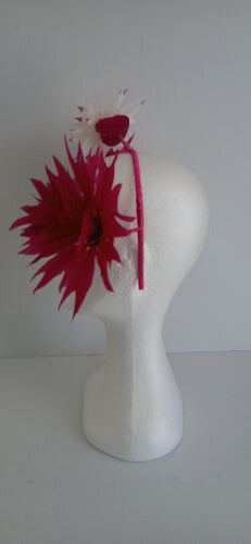 A picture of the pink and white feather flower headband by Melissa Rath Millinery.