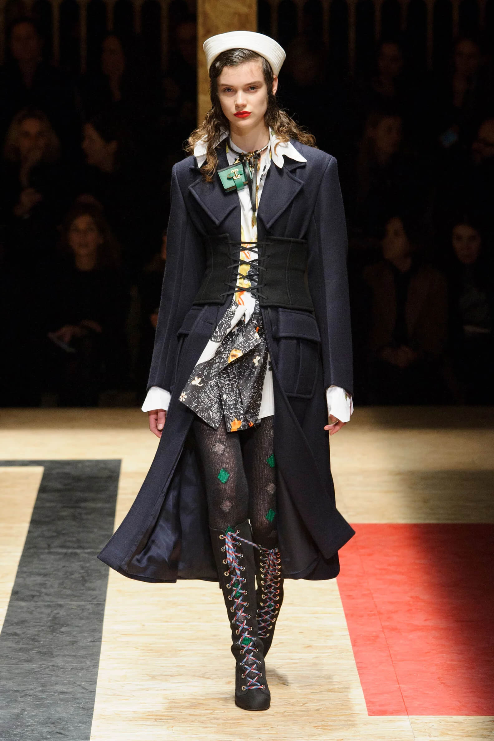 A picture of a model on the catwalk for the Prada 2016 catwalk show.