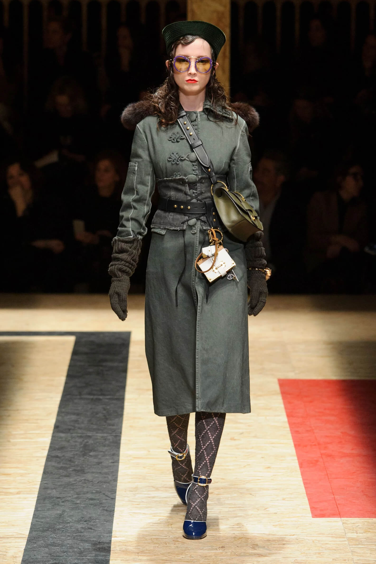A picture of a model on the catwalk for the Prada 2016 catwalk show.
