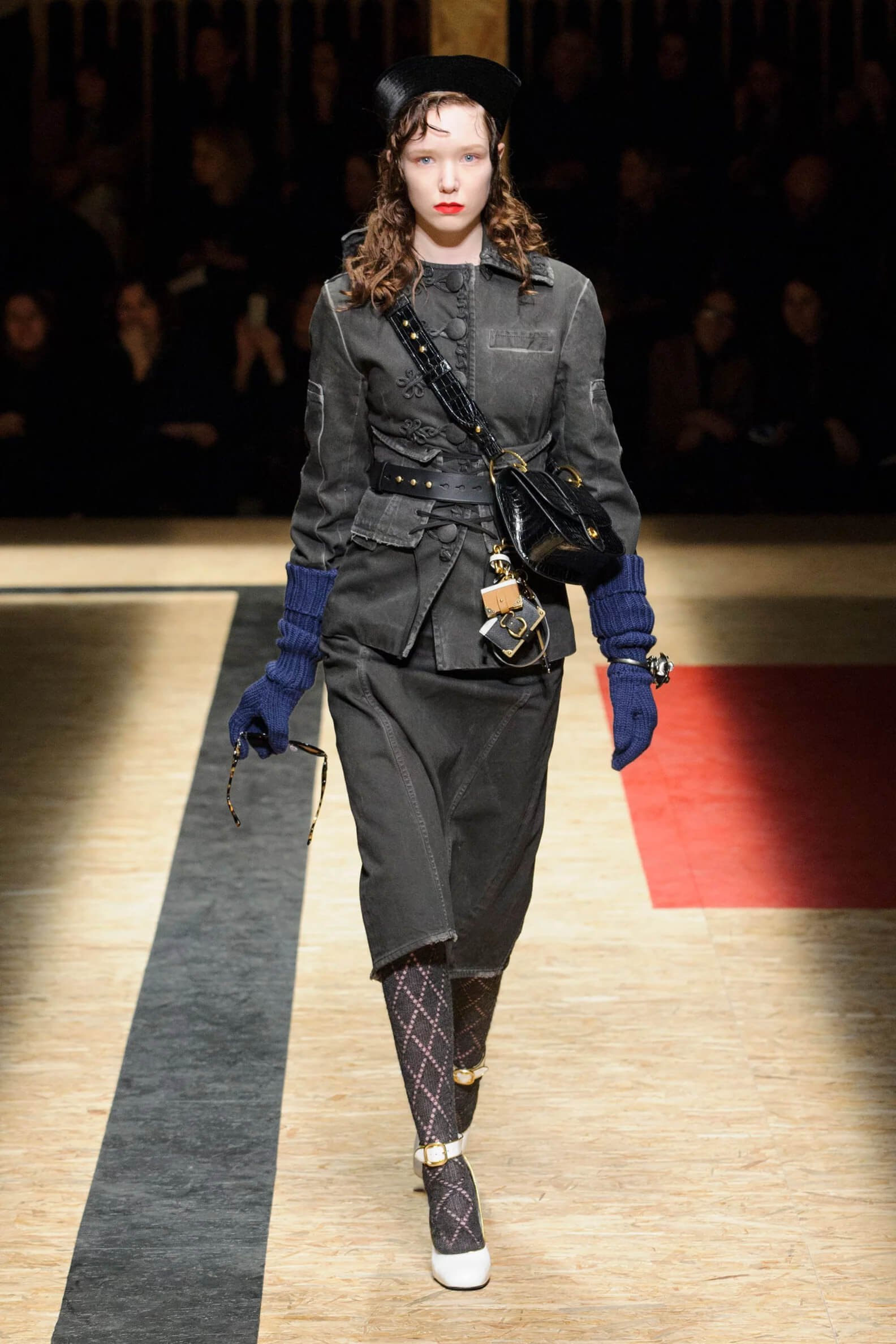 A picture of a model on the catwalk for the Prada 2016 catwalk show.