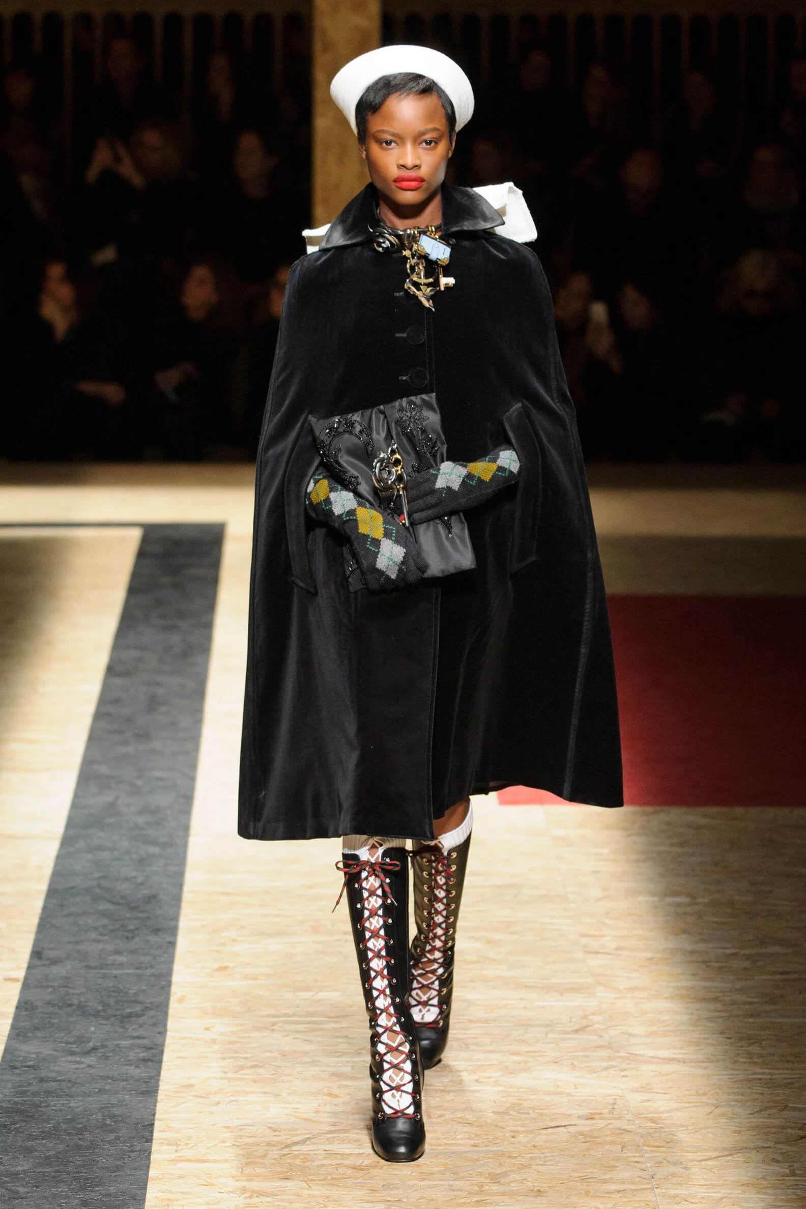 A picture of a model on the catwalk for the Prada 2016 catwalk show.