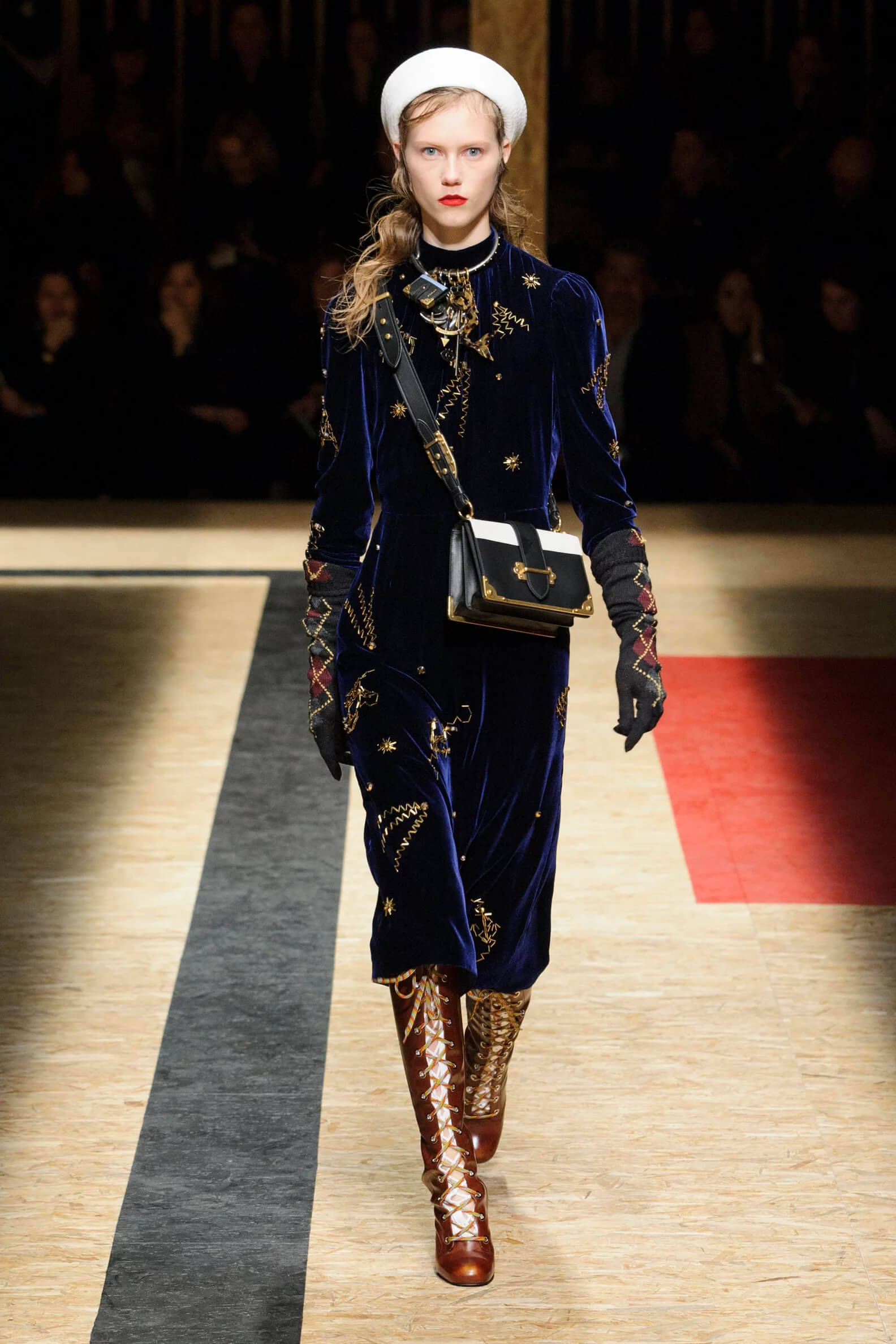 A picture of a model on the catwalk for the Prada 2016 catwalk show.