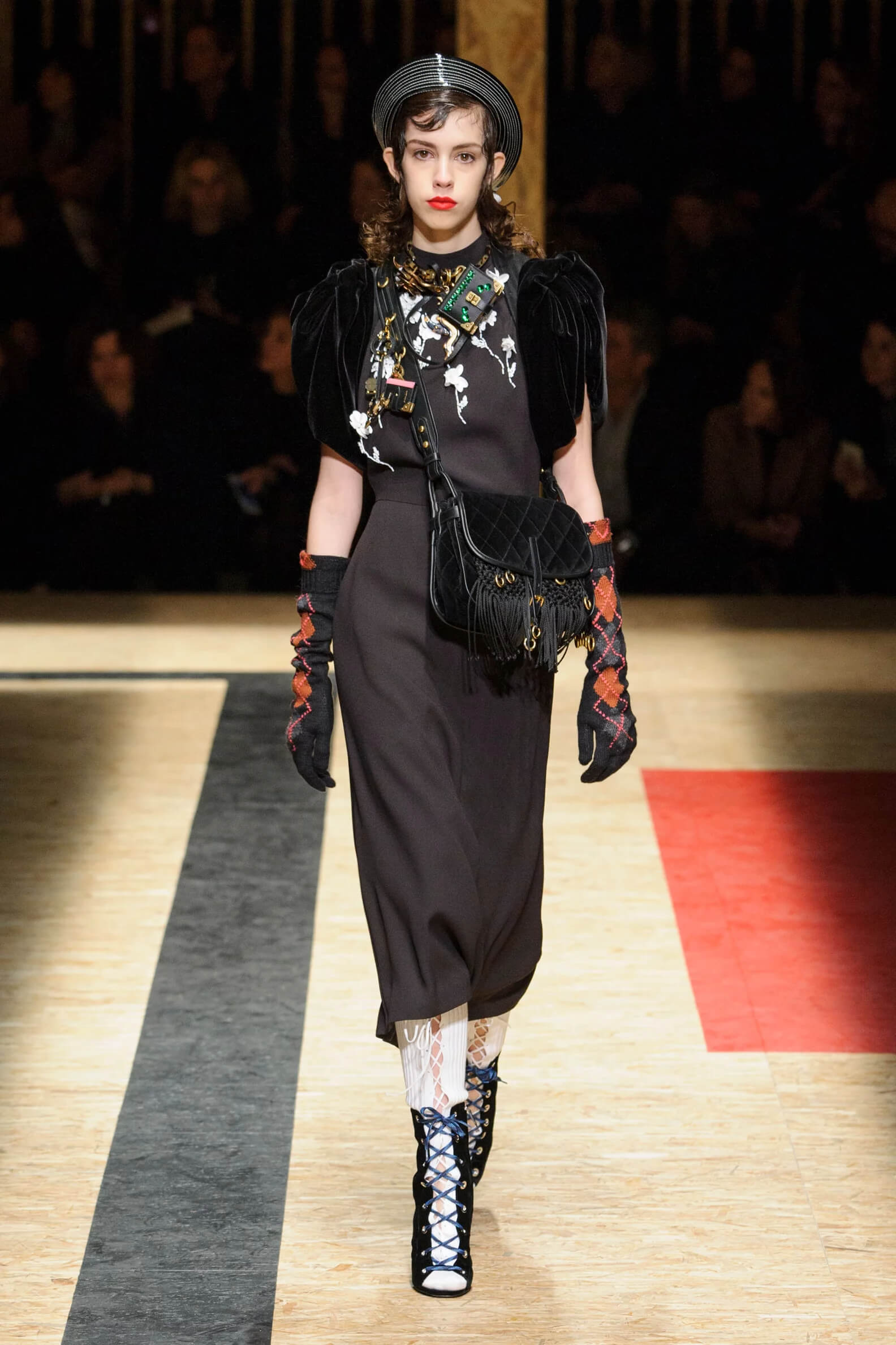 A picture of a model on the catwalk for the Prada 2016 catwalk show.