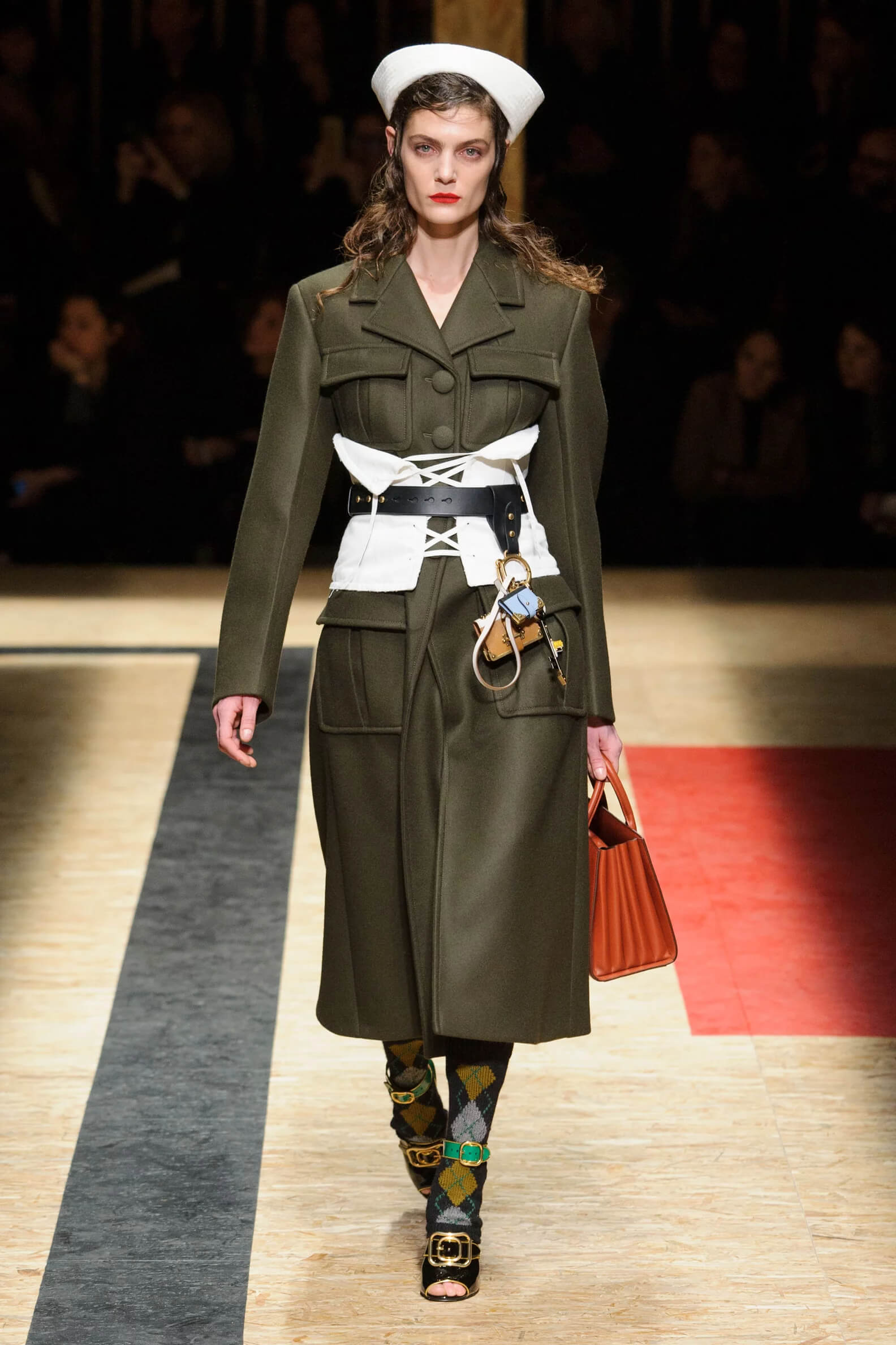 A picture of a model on the catwalk for the Prada 2016 catwalk show.