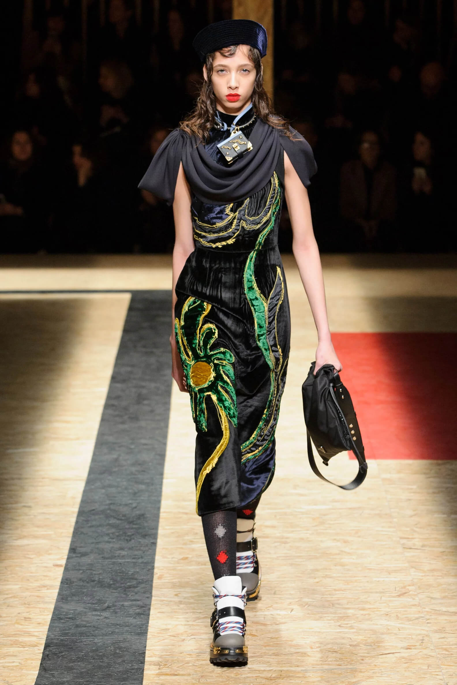A picture of a model on the catwalk for the Prada 2016 catwalk show.