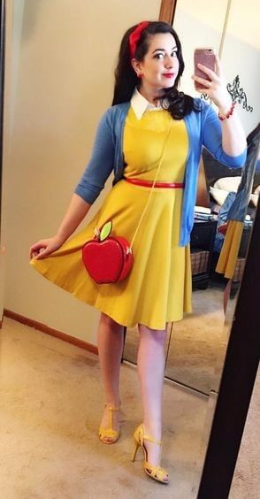 A picture of a red primary colour outfit suggestion for the Red Pleather Heart Headband by Melissa Rath Millinery.
