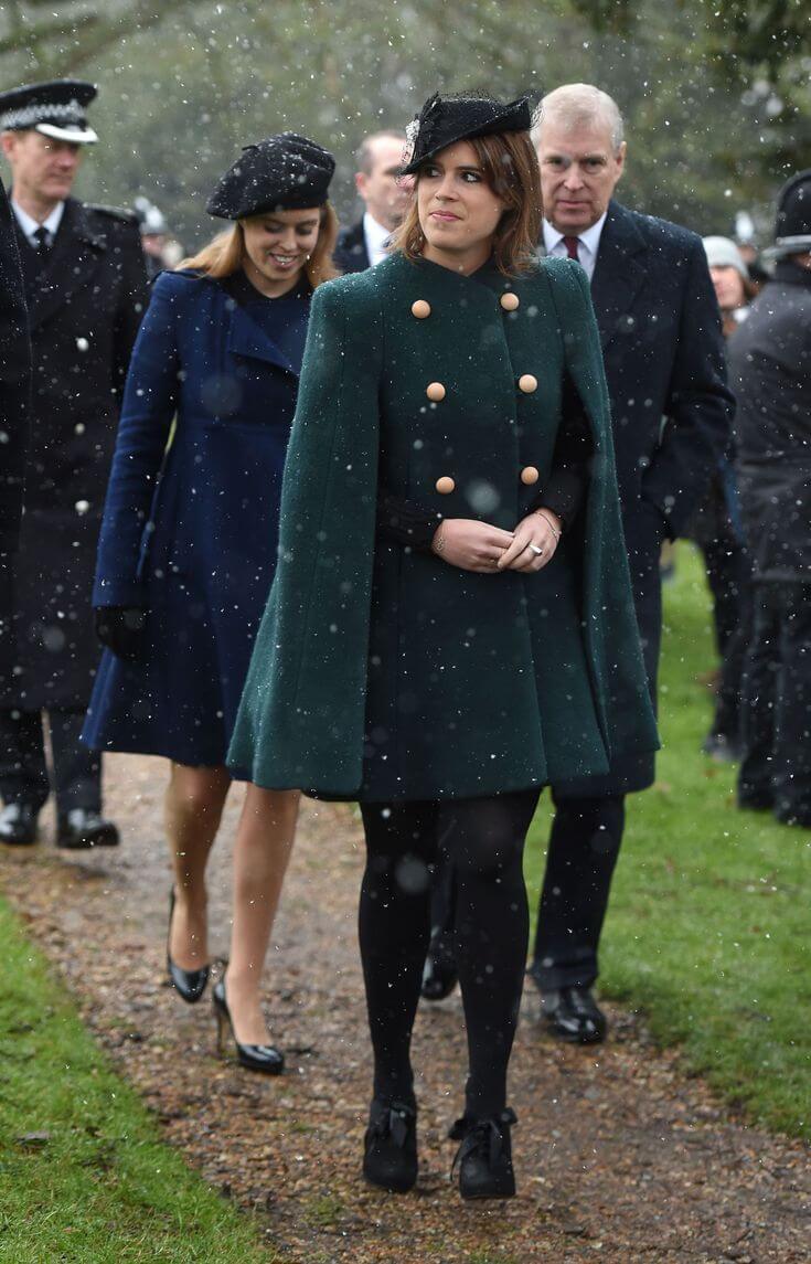 A picture of Princesses Beatrice and Eugenie in festive Christmas Day outfits.