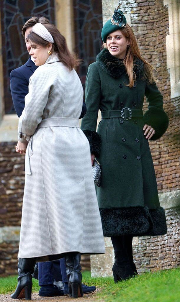 A picture of Princesses Beatrice and Eugenie in festive Christmas Day outfits.