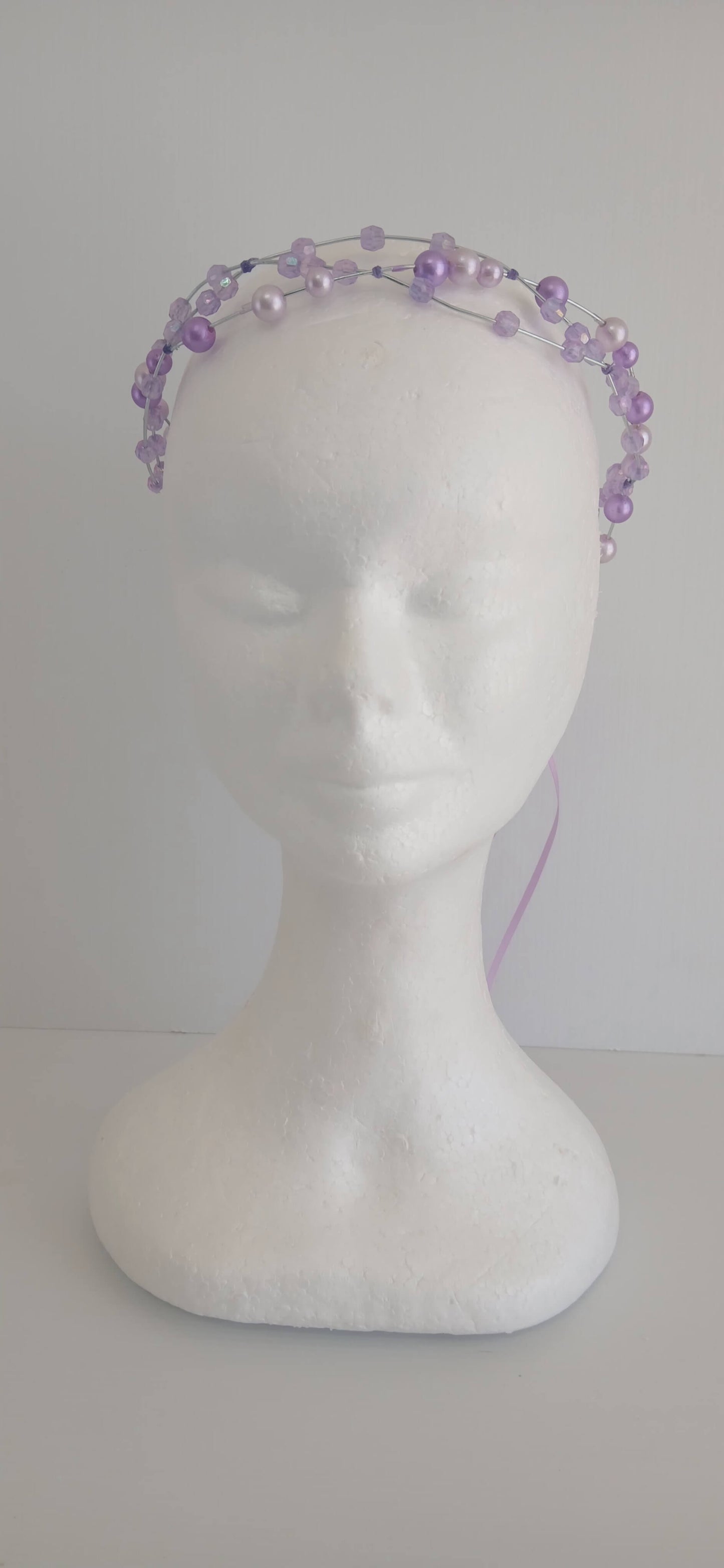 An image of the  Purple Beaded Halo Headband by Melissa Rath Millinery