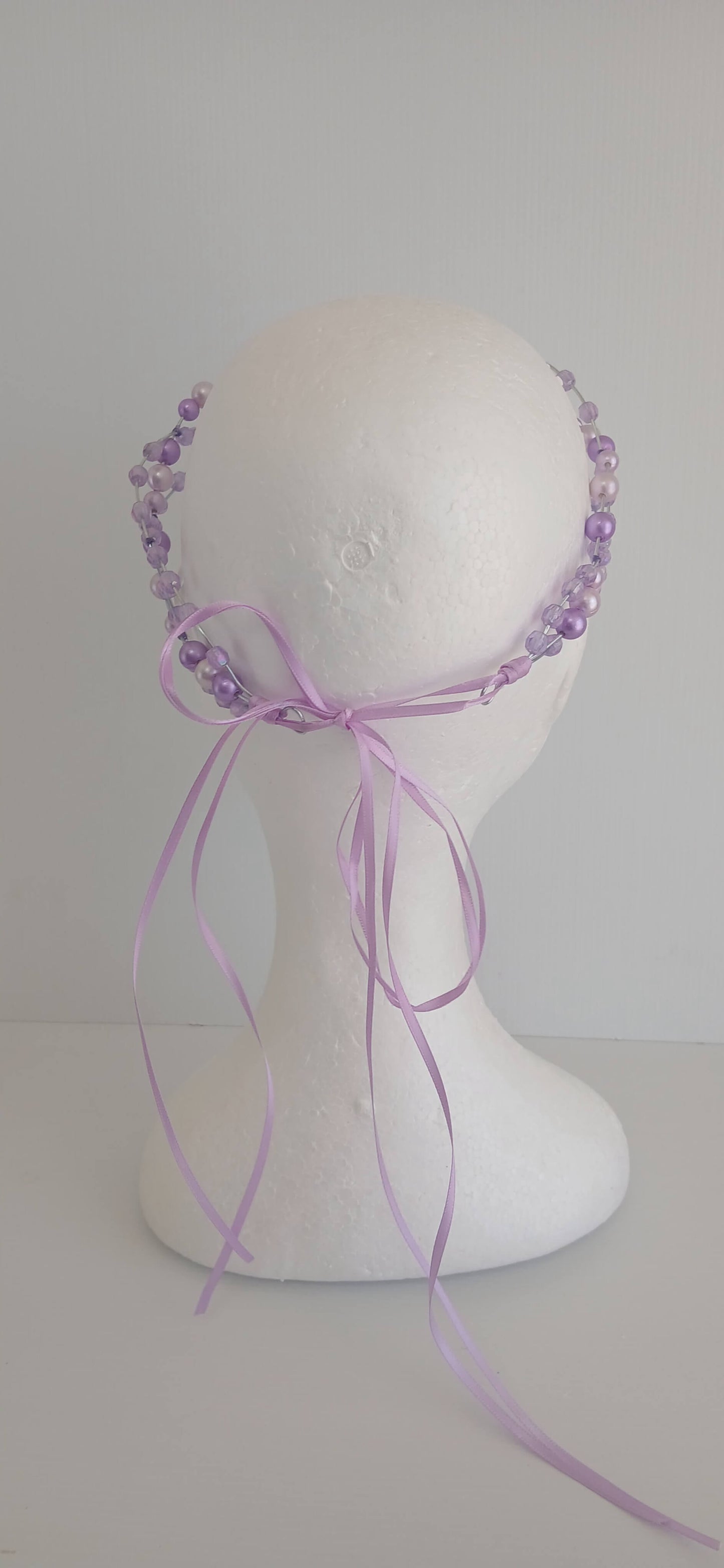 An image of the  Purple Beaded Halo Headband by Melissa Rath Millinery