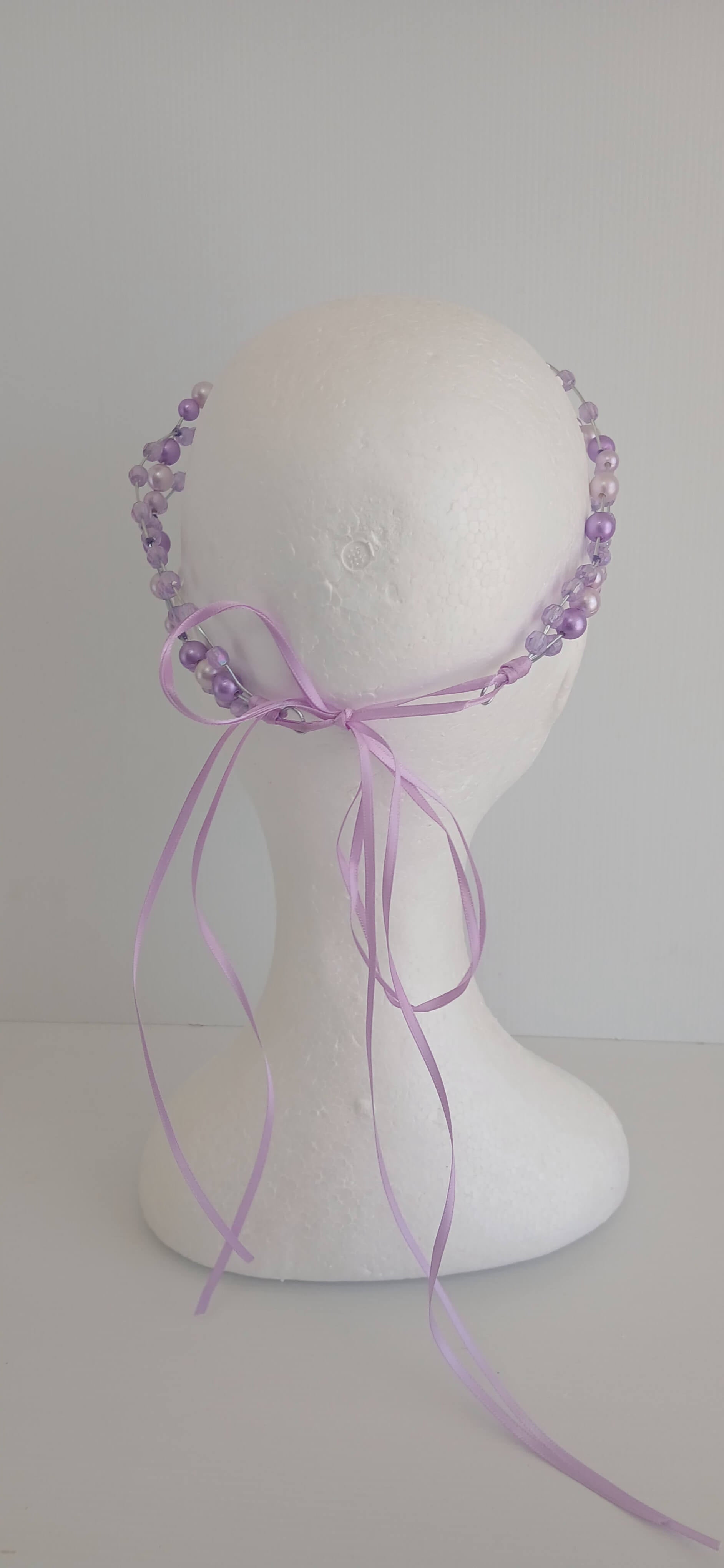 An image of the  Purple Beaded Halo Headband by Melissa Rath Millinery