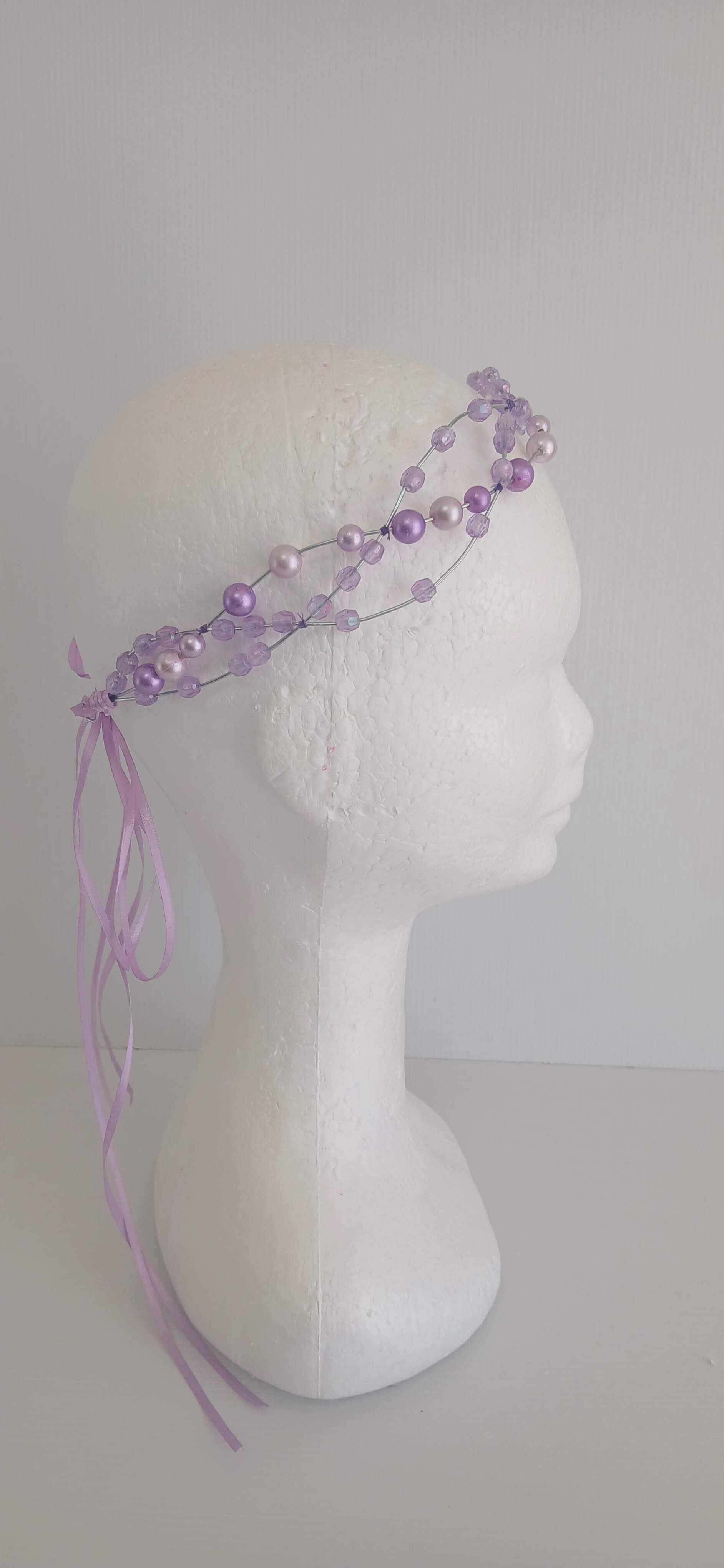 An image of the  Purple Beaded Halo Headband by Melissa Rath Millinery