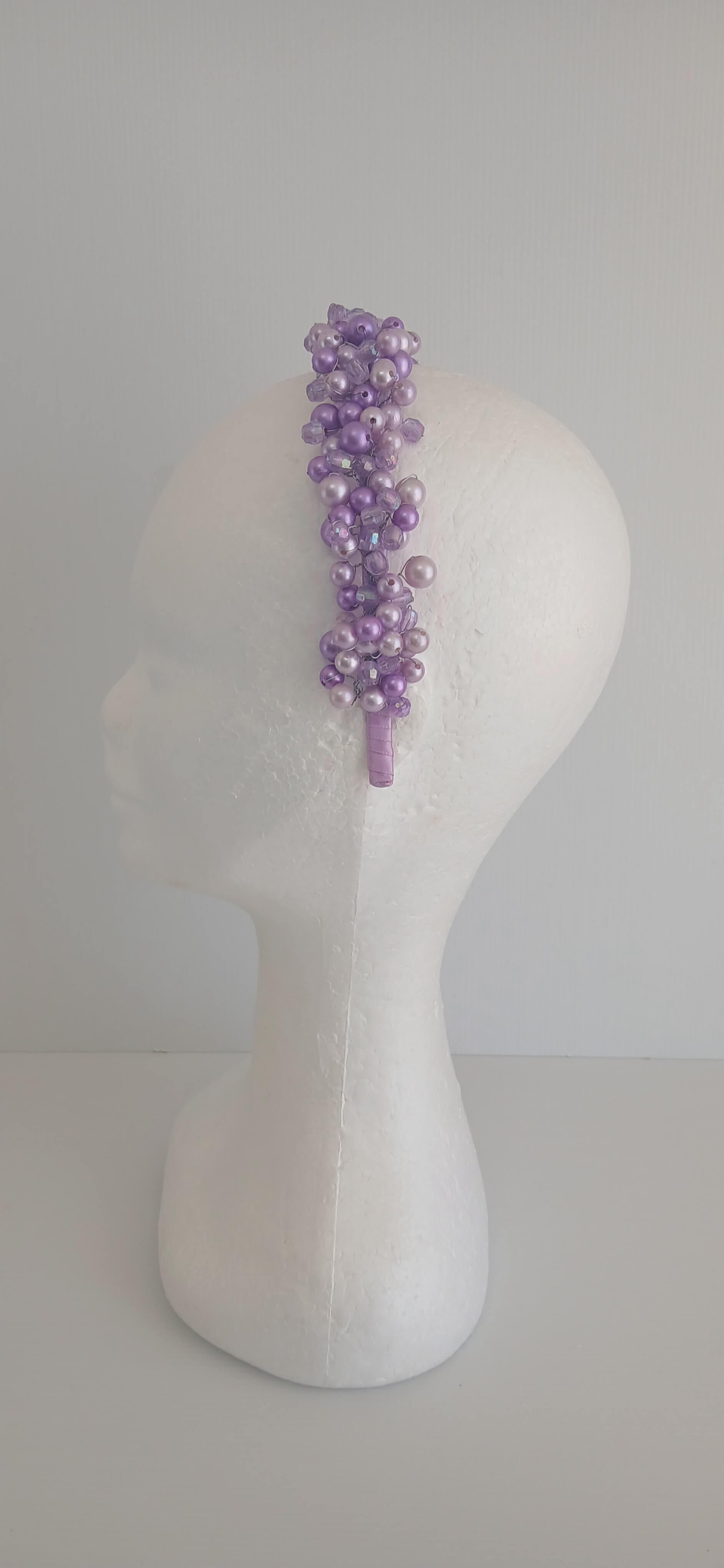 An image of the  Purple Beaded Headband by Melissa Rath Millinery