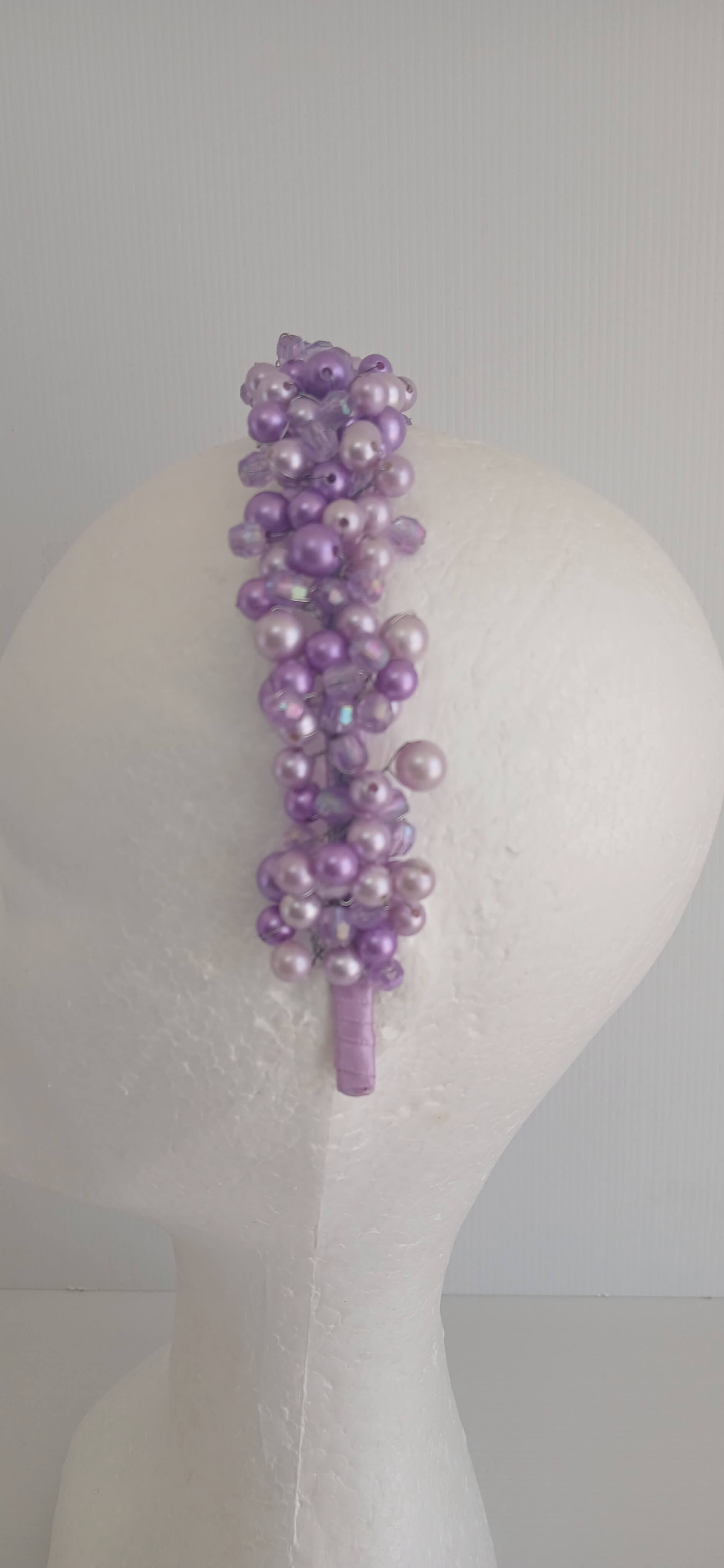 An image of the  Purple Beaded Headband by Melissa Rath Millinery