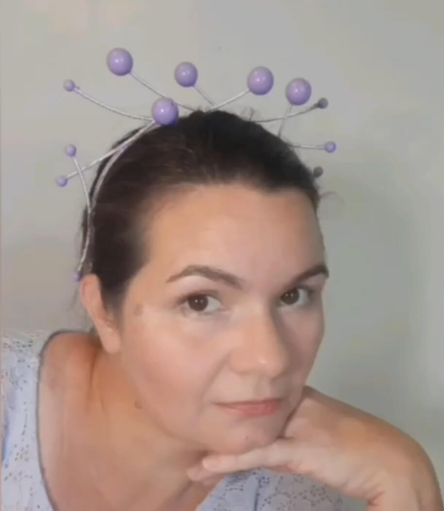 A picture of a purple beaded millinery headband by Melissa Rath Millinery.