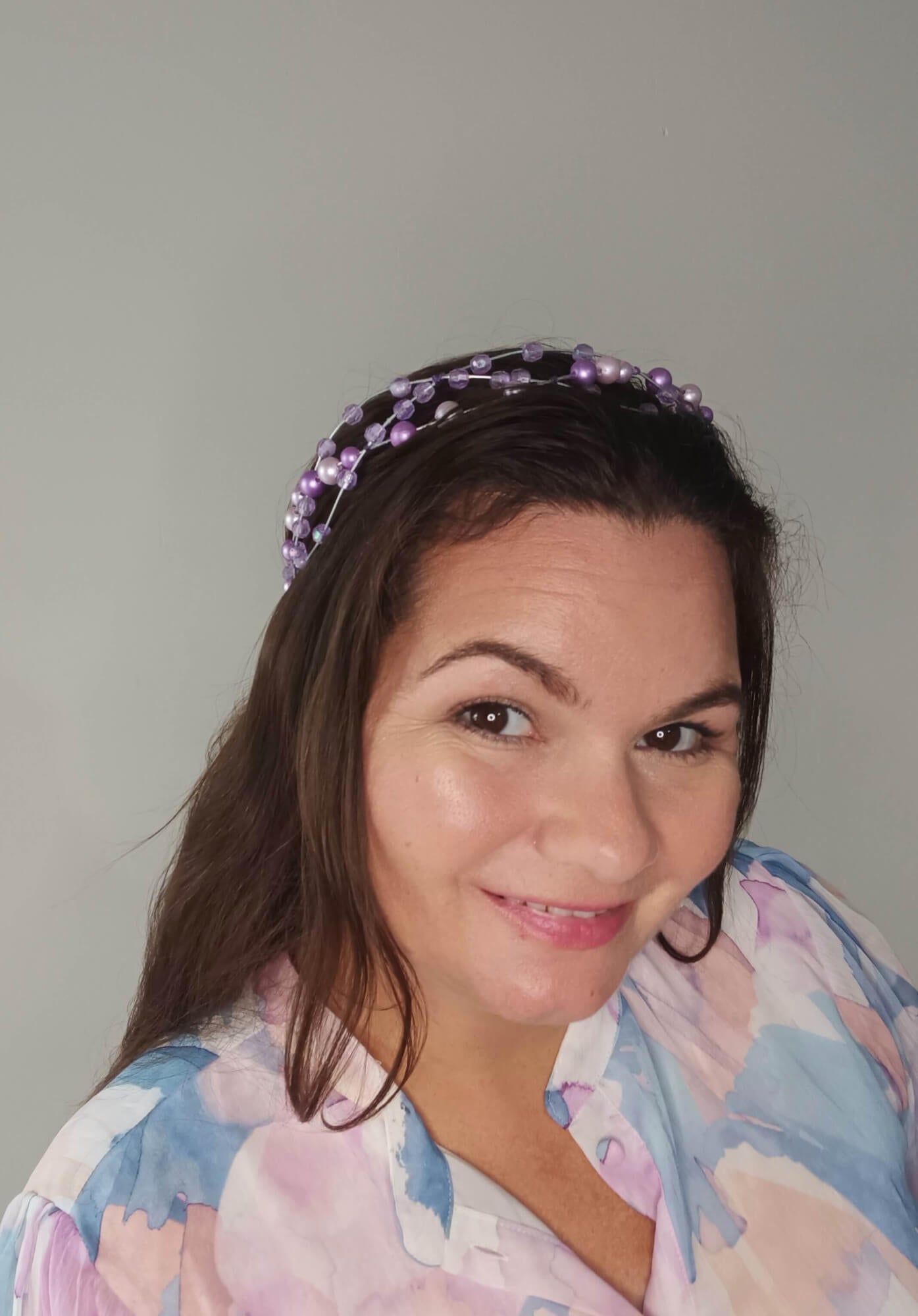 A picture of a Purple Beaded Millinery Halo by Melissa Rath Millinery
