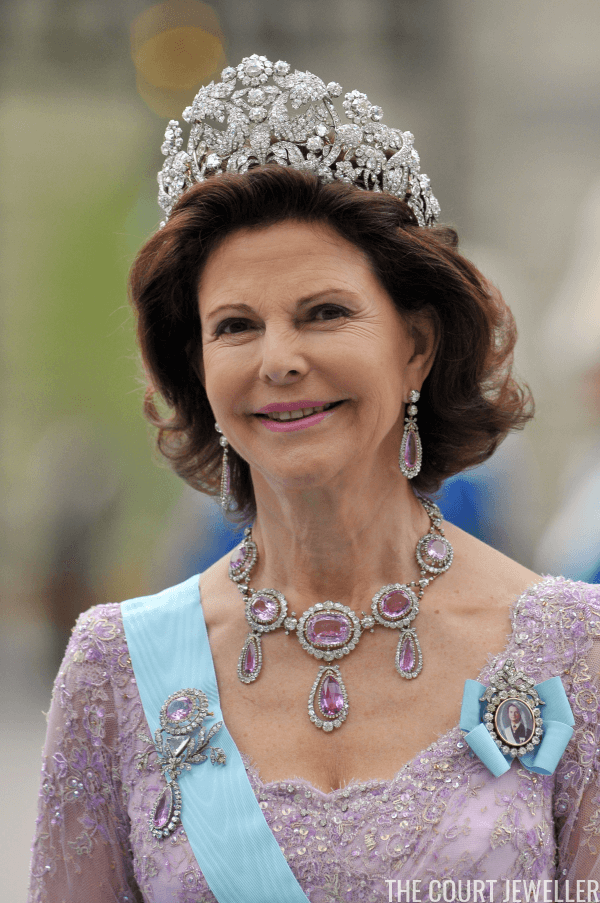 A picture of Queen Silvia of Sweden wearing the Braganza Tiara which was first worn by Empress Amelie is 1829.