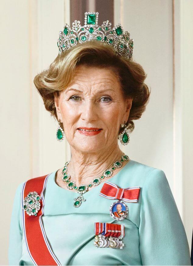 A picture of Queen Sonja of Norway wearing the Norwegian Emerald Parure which is believed to have been a wedding present in 1806.