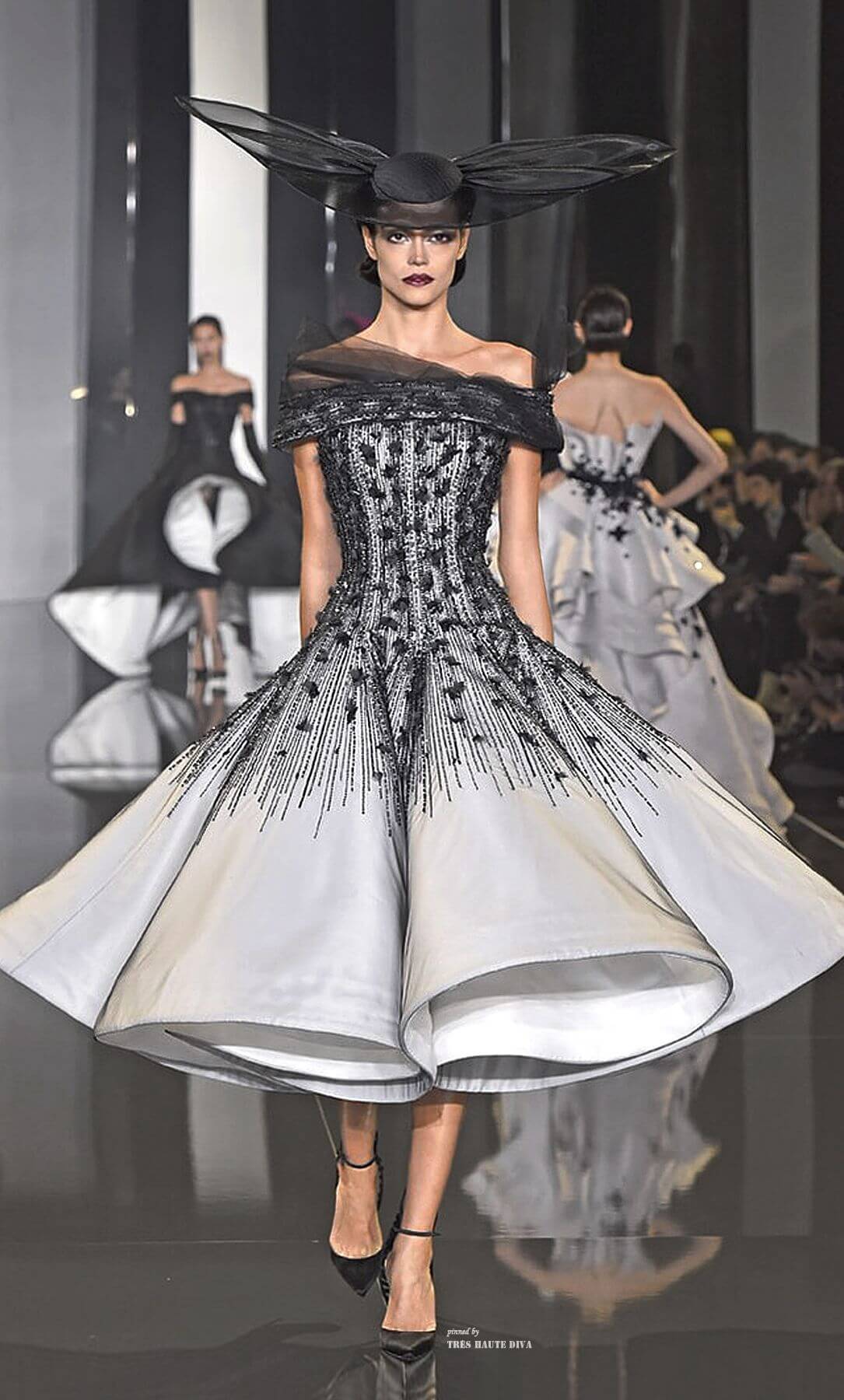 A picture of a model on the catwalk for Ralph and Russo 2014.