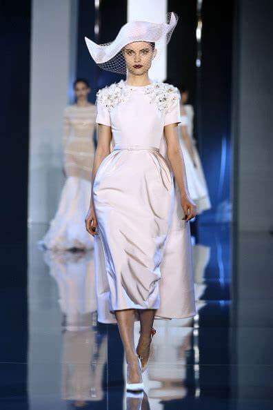 A picture of a model on the catwalk for Ralph and Russo 2014.