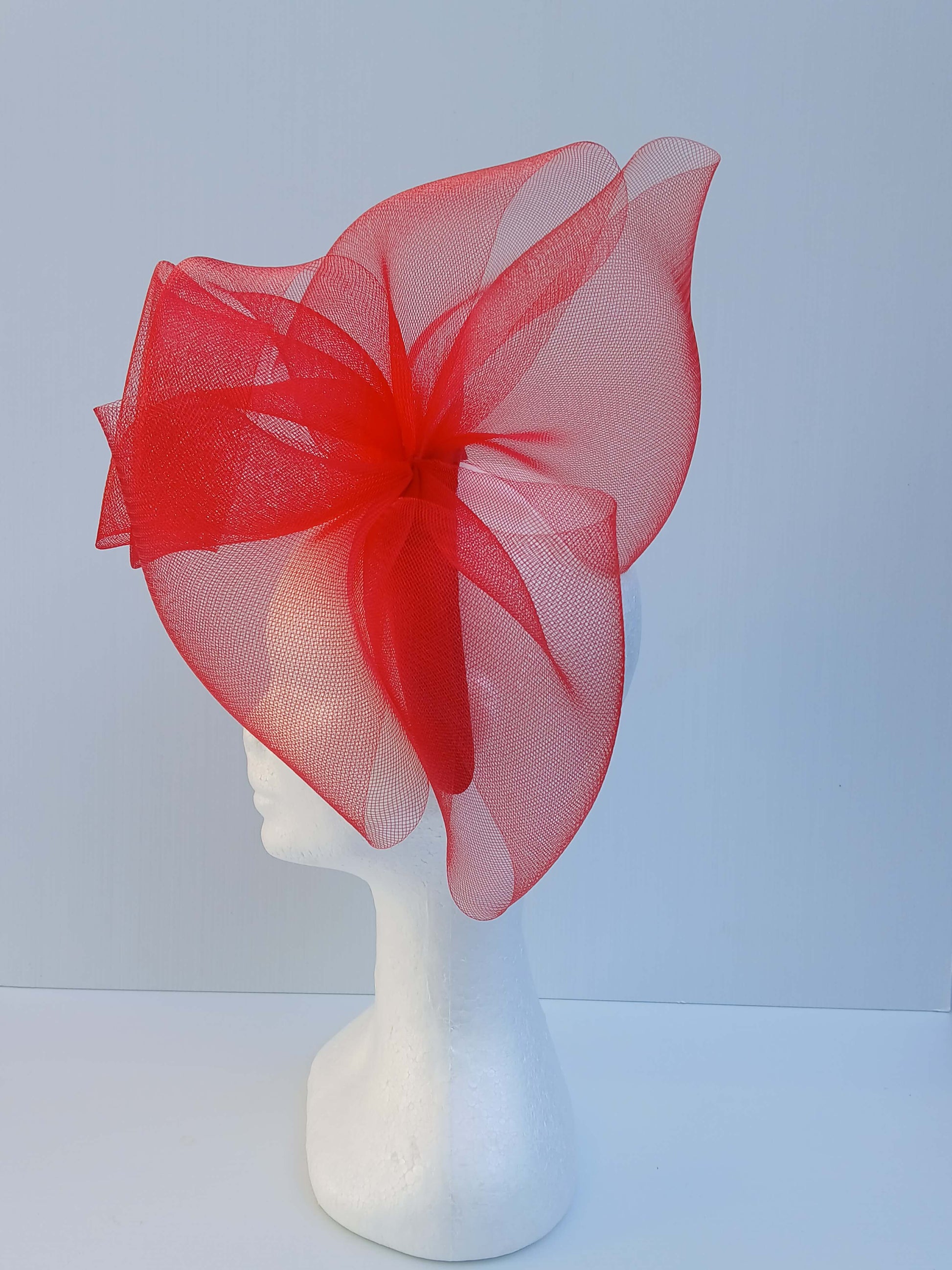 An image of a Red Padded Headband with Crinoline Bow and Rose by Melissa Rath Millinery