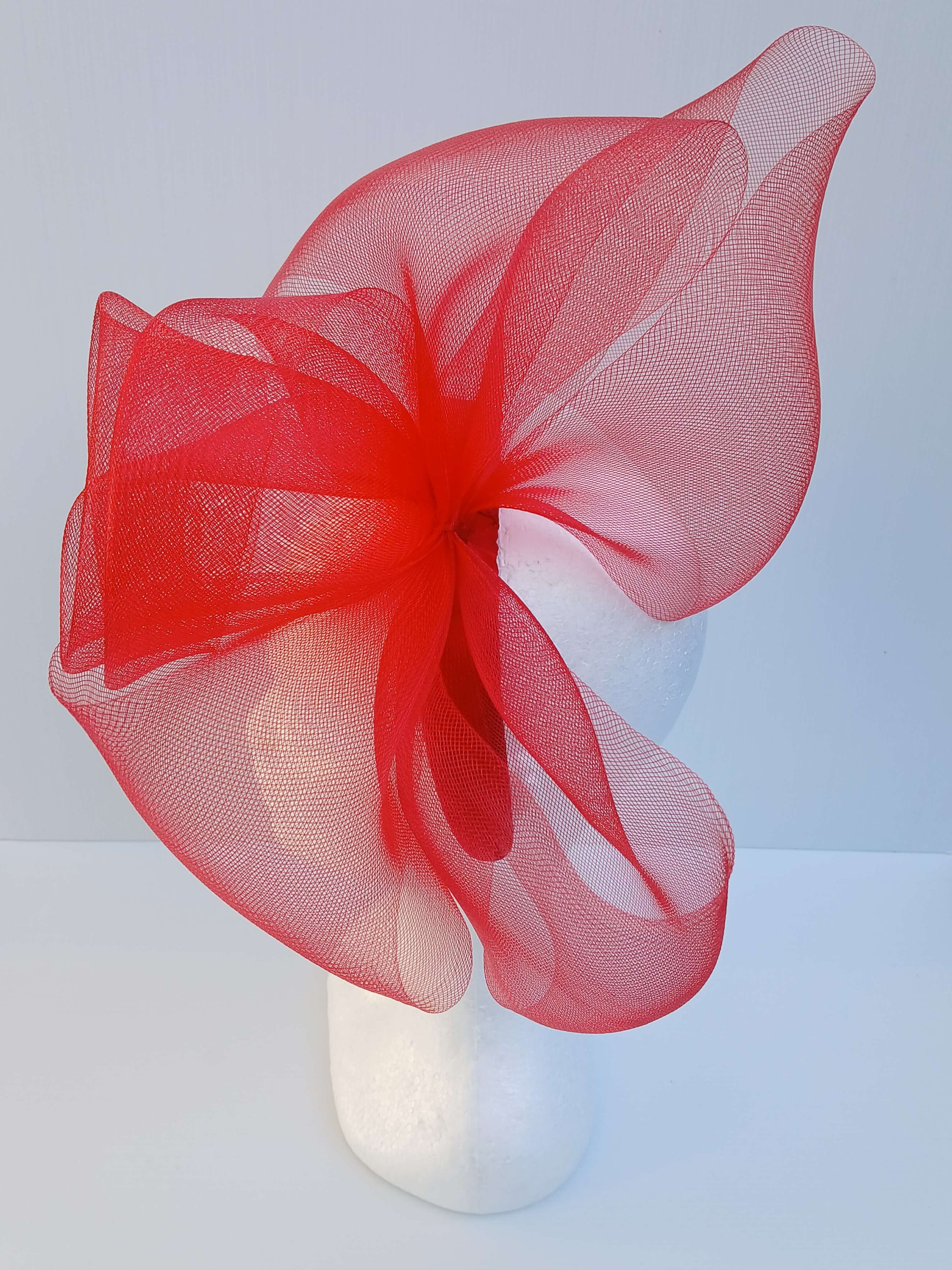 An image of a Red Padded Headband with Crinoline Bow and Rose by Melissa Rath Millinery