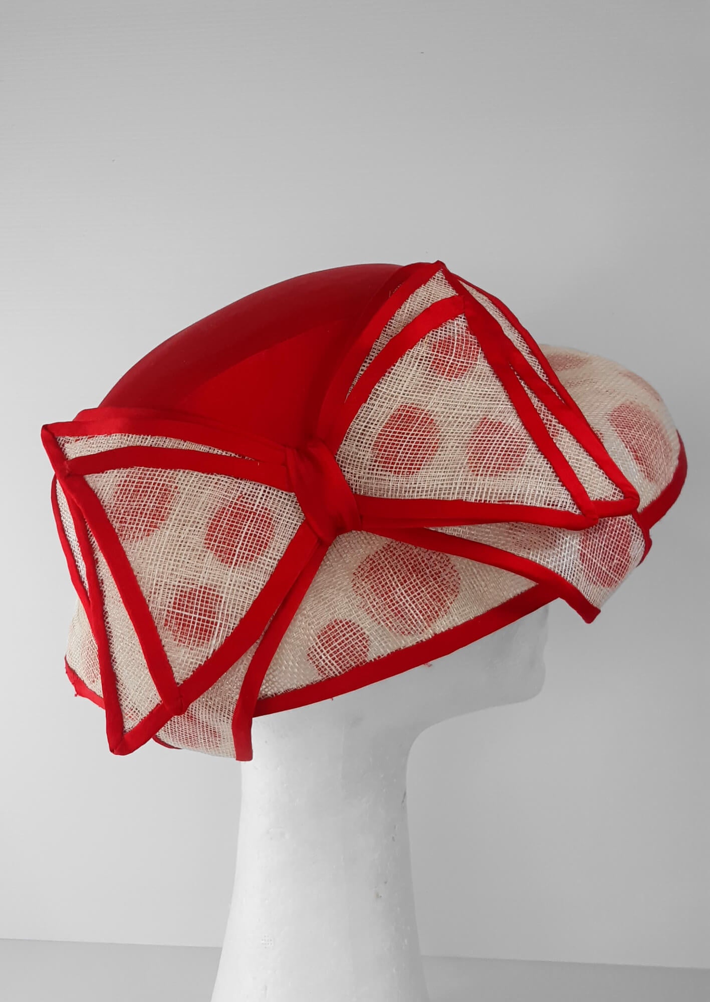 A picture of a Red and White Hat by Melissa Rath Millinery