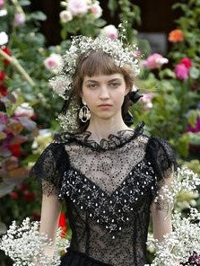 A picture of a model on the catwalk for Rodartes SS 2018 Collection.