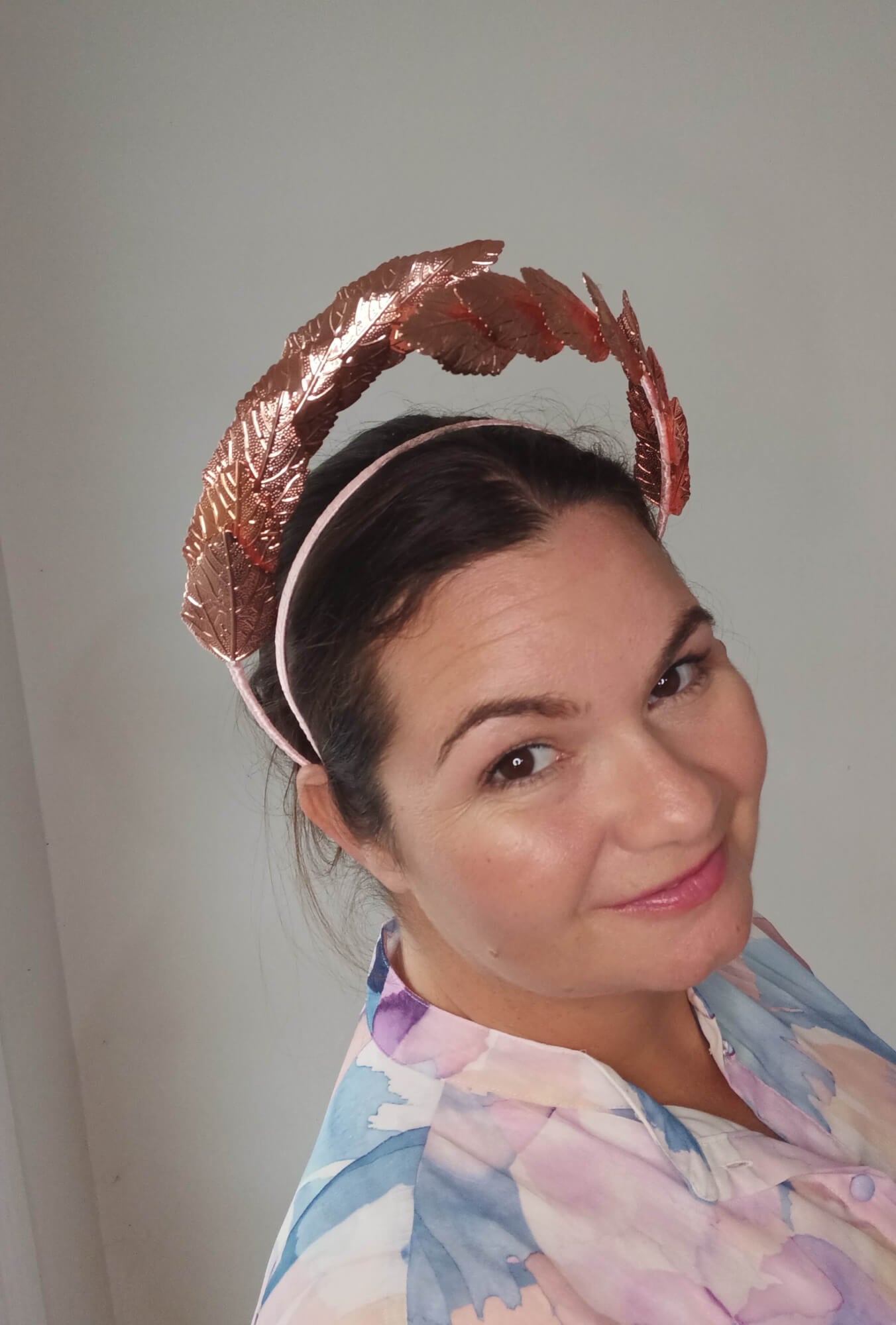 A picture of a Rose Gold Leaf Millinery Headband by Melissa Rath Millinery.