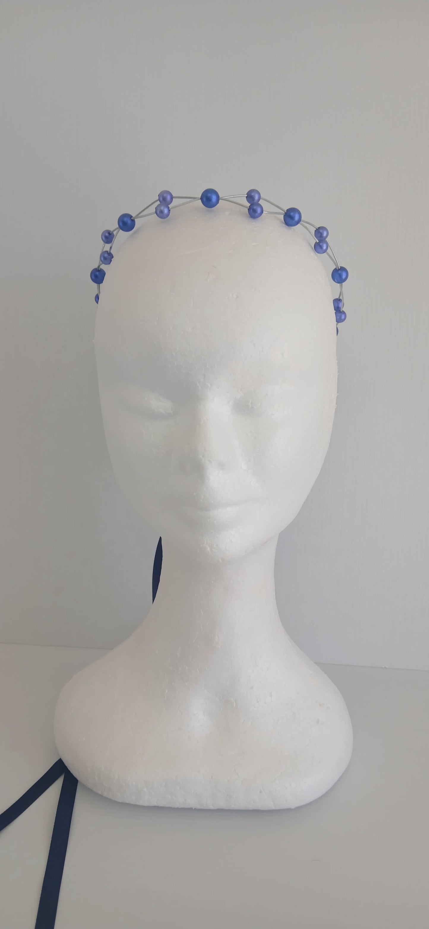 An image of the Royal Blue Beaded Halo Crown by Melissa Rath Millinery