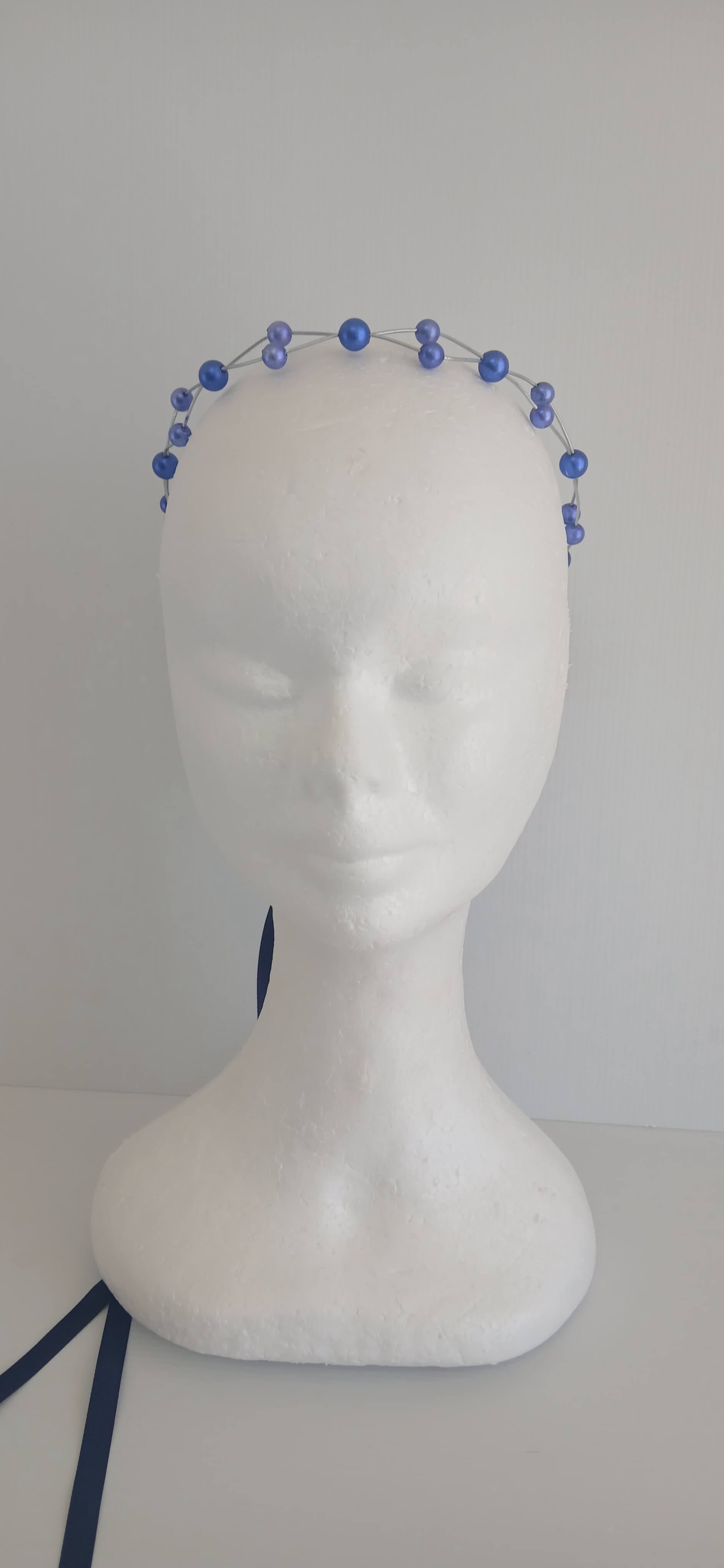 An image of the Royal Blue Beaded Halo Crown by Melissa Rath Millinery