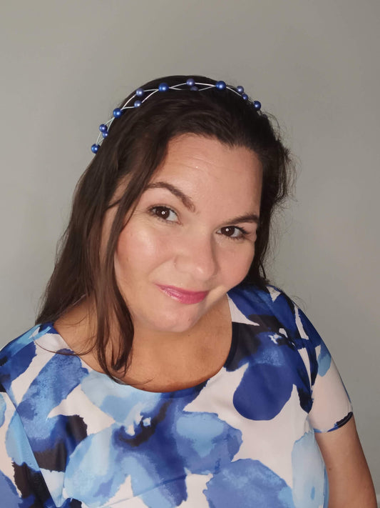 A picture of a Blue Beaded Halo Crown by Melissa Rath Millinery