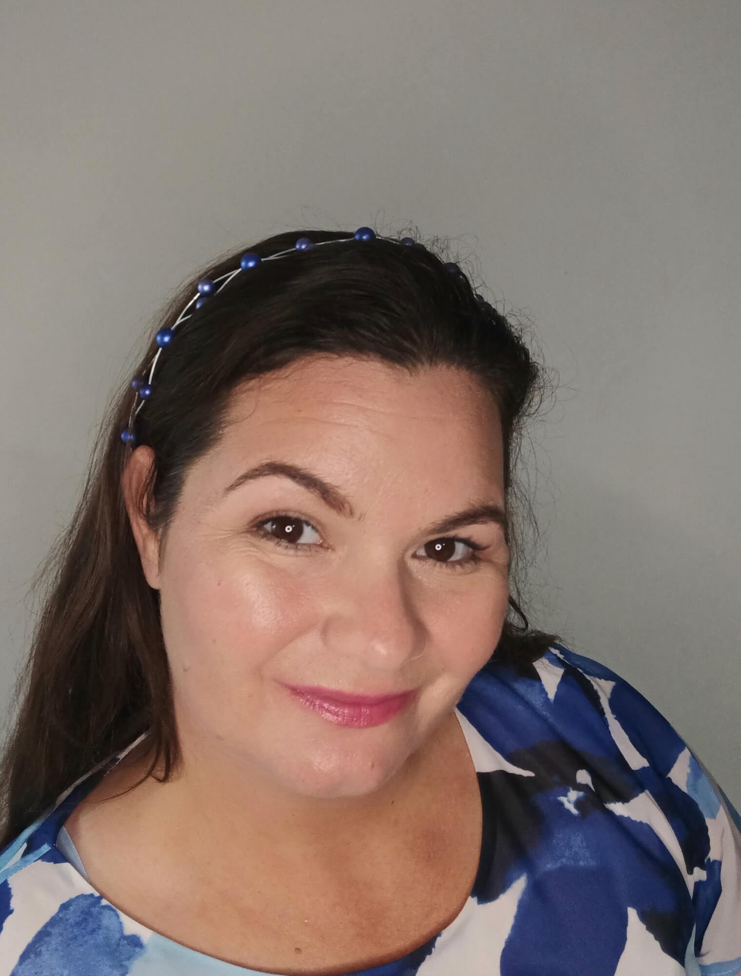 A picture of a Blue Beaded Halo Crown by Melissa Rath Millinery