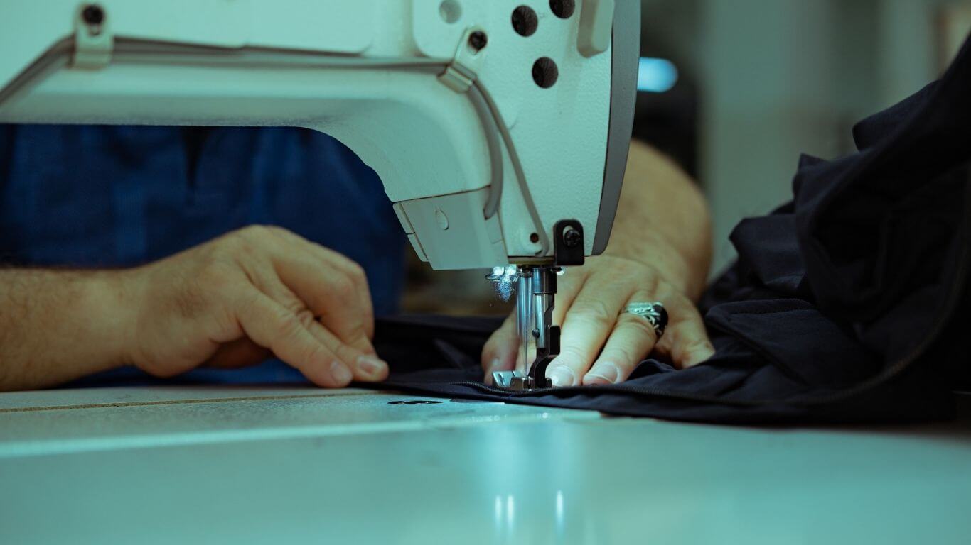 An image of someone using a sewing machine.