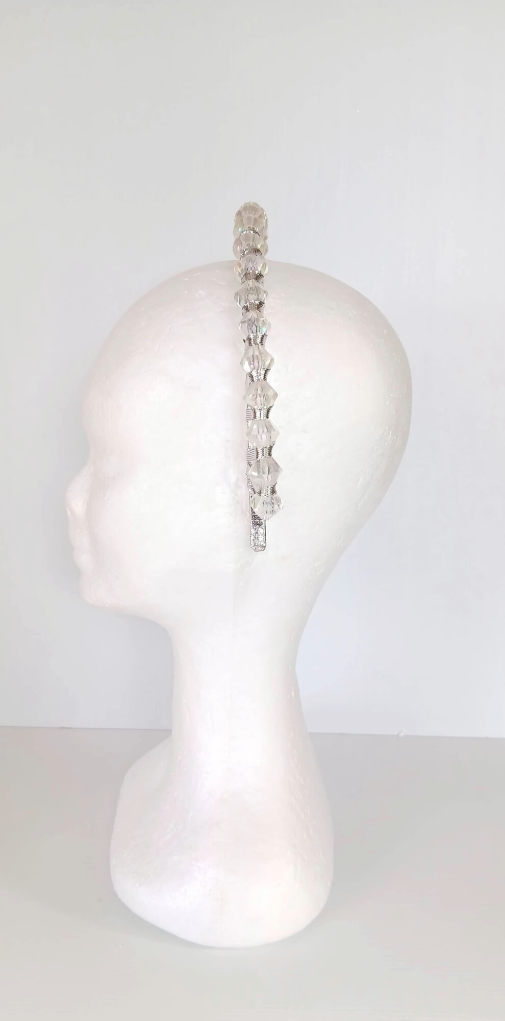 A picture of a Silver Beaded Ribbon Millinery Headband by Melissa Rath Millinery.