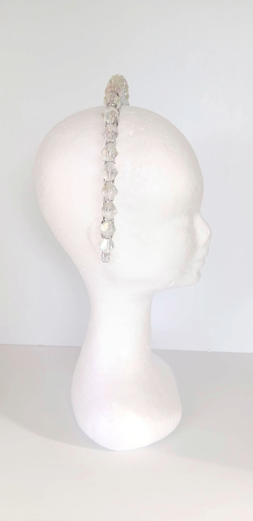 A picture of a Silver Beaded Ribbon Millinery Headband by Melissa Rath Millinery.