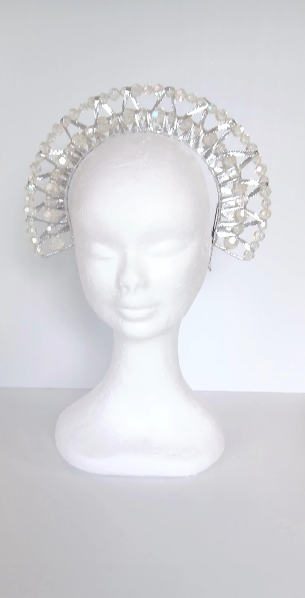 A picture of a Silver Double Ribbon Beaded  Millinery Headband by Melissa Rath Millinery.
