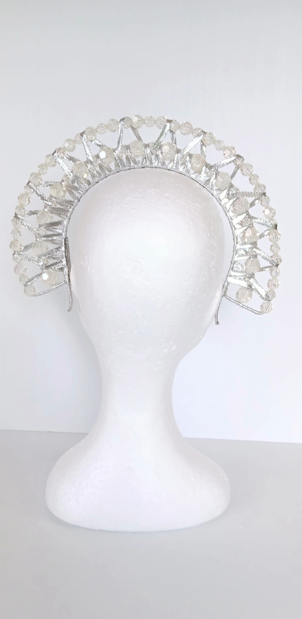 A picture of a Silver Double Ribbon Beaded  Millinery Headband by Melissa Rath Millinery.