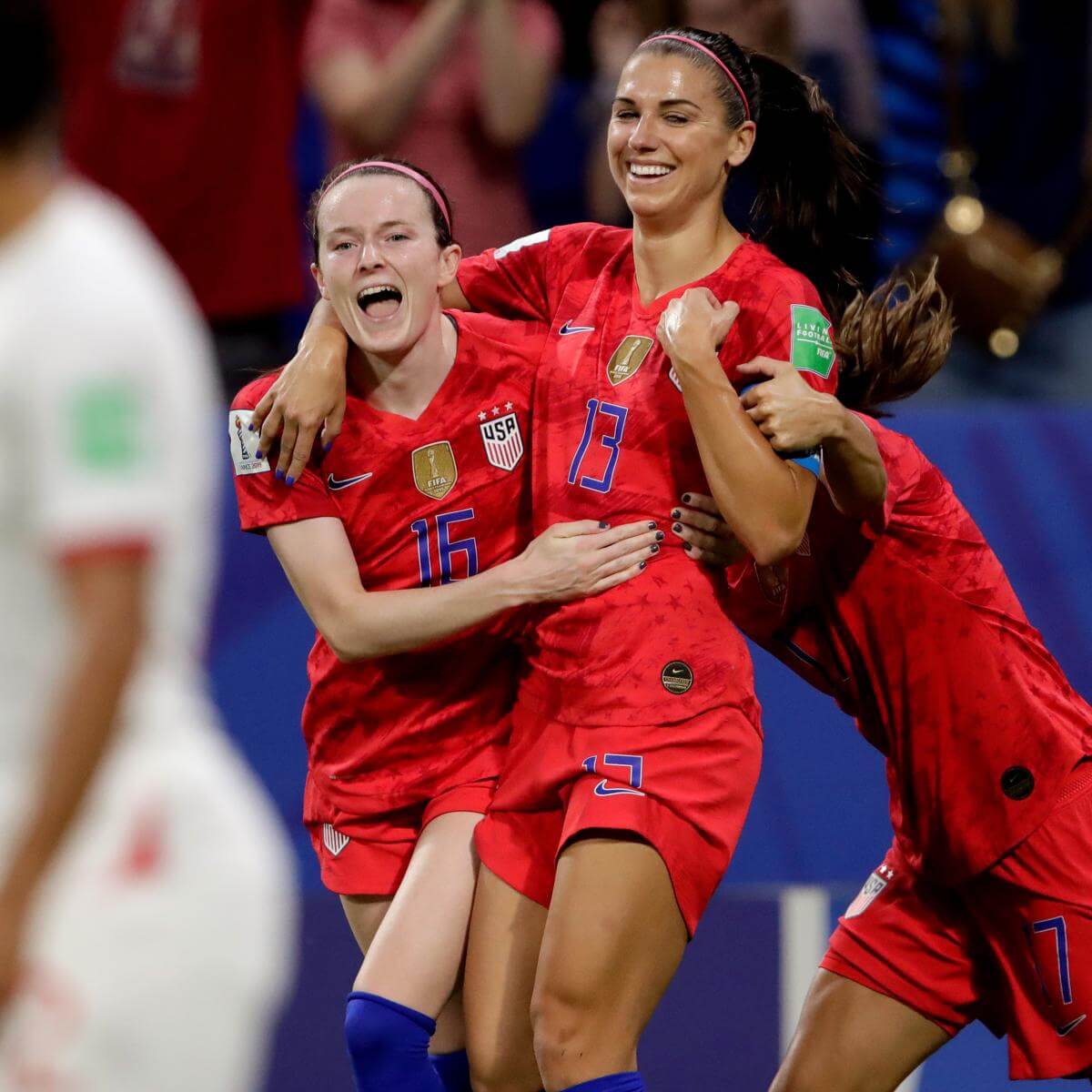 A picture of The US women's soccer team, who are just one of any sporting teams who wear red.