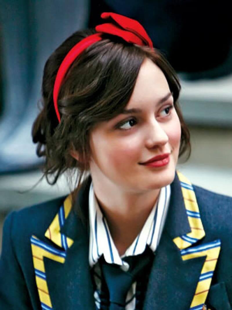 A picture of a hair style suggestion for the Red Pleather Heart Headband by Melissa Rath Millinery.