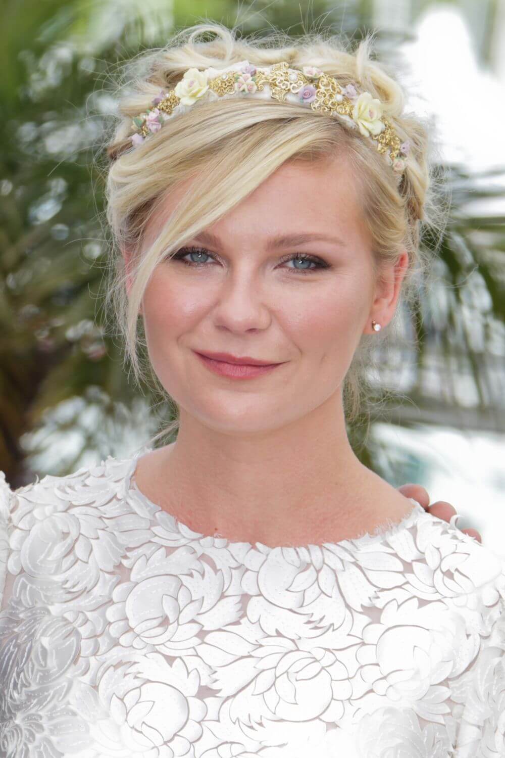 A picture of a hair style suggestion for the Red Pleather Heart Headband by Melissa Rath Millinery.