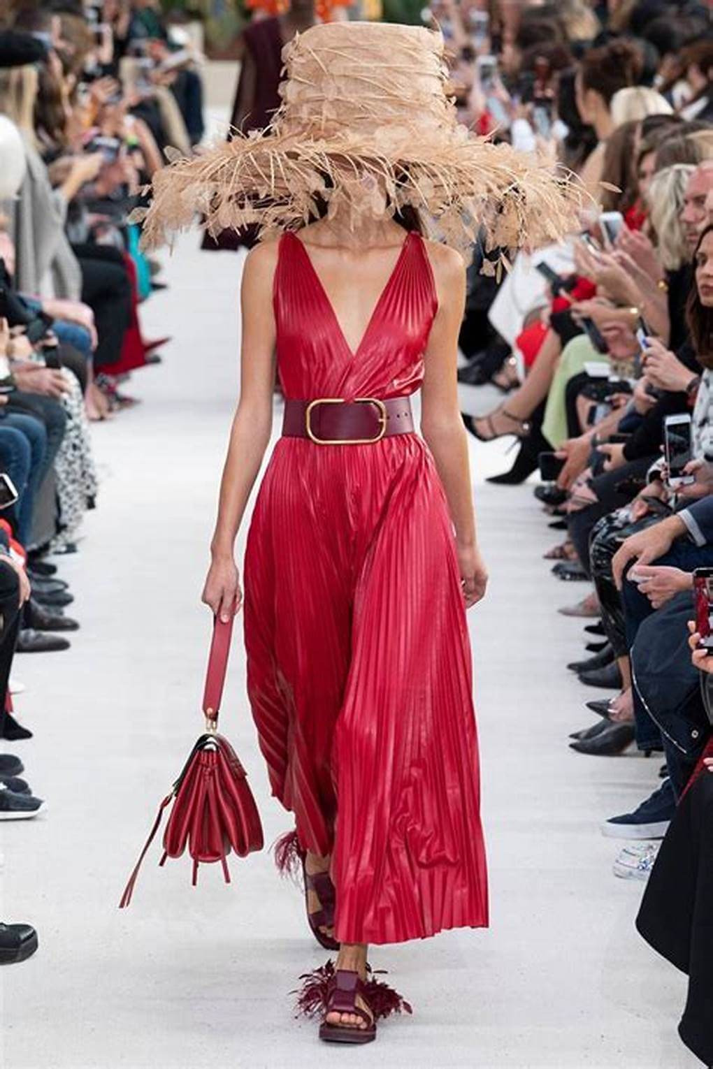 A picture of a model on the catwalk for Valentino SS 2019.