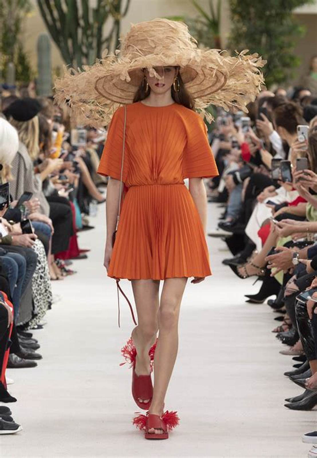 A picture of a model on the catwalk for Valentino SS 2019.