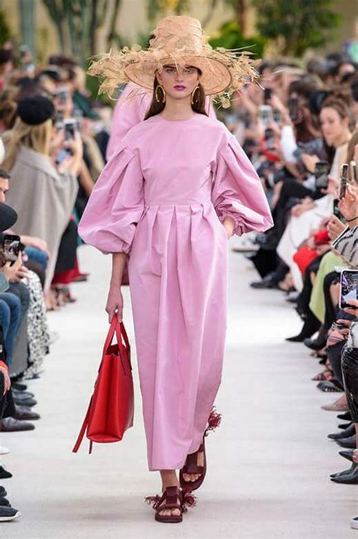 A picture of a model on the catwalk for Valentino SS 2019.