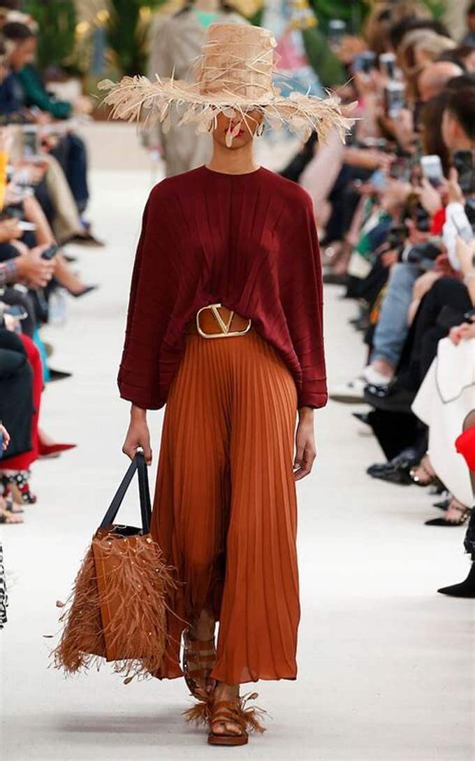 A picture of a model on the catwalk for Valentino SS 2019.