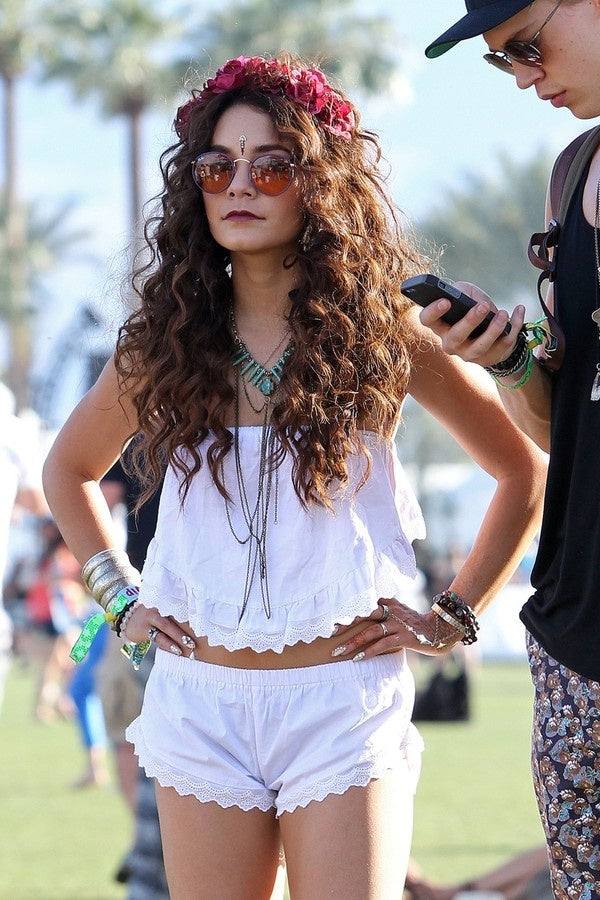 A picture of Vanessa Hudgens wearing a crown at the Coachella.