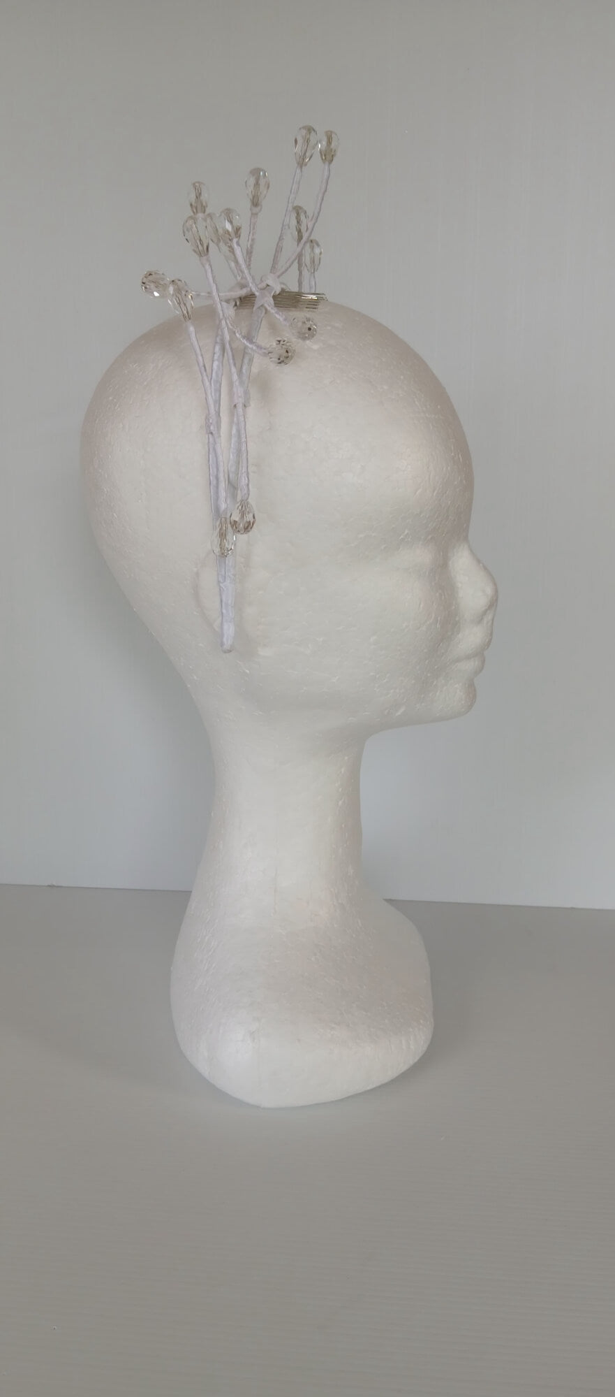 A picture of a White Beaded Millinery Headband by Melissa Rath Millinery.