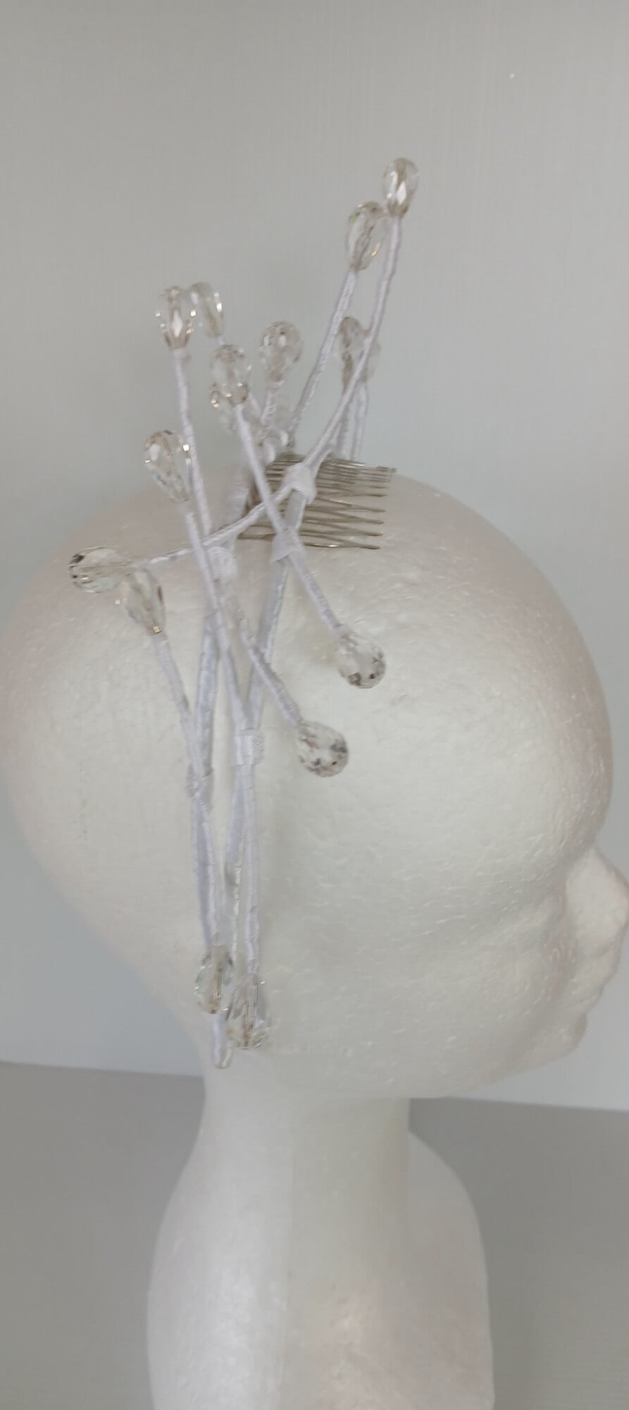 A picture of a White Beaded Millinery Headband by Melissa Rath Millinery.