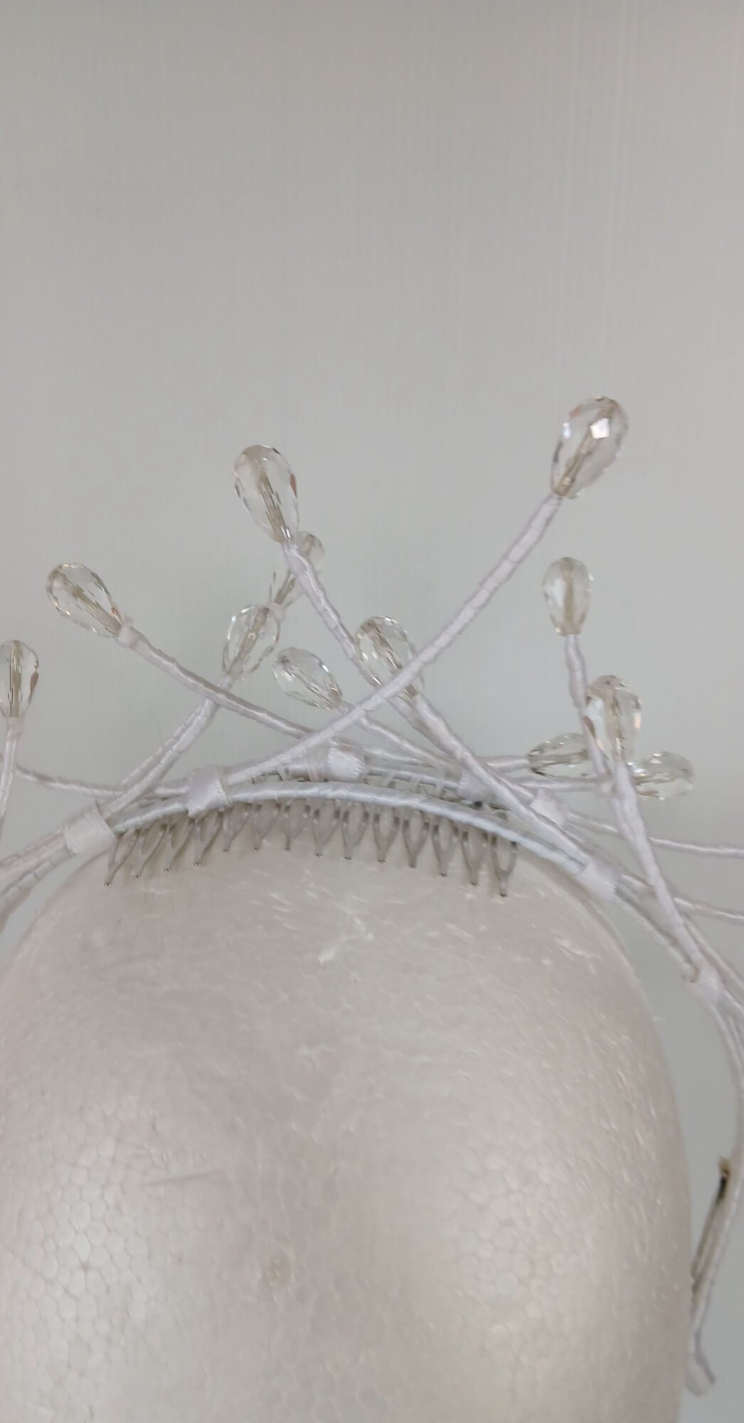 A picture of a White Beaded Millinery Headband by Melissa Rath Millinery.